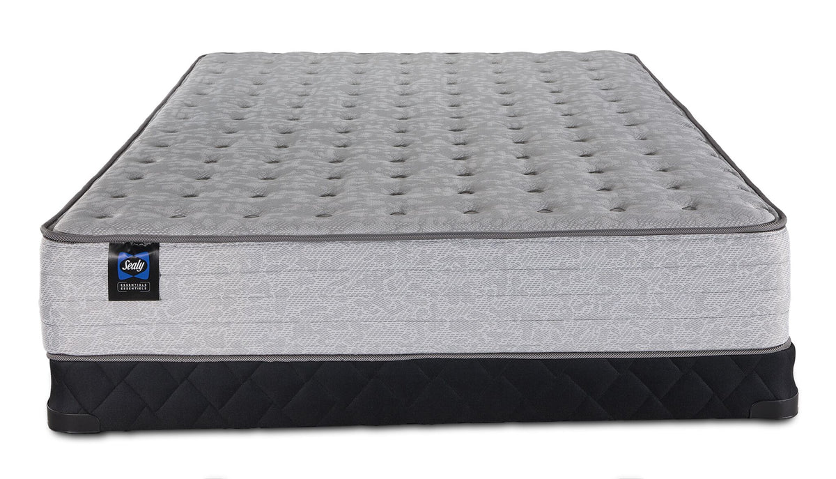 Sealy Burchelle Extra Firm Tight Top Queen mattress with black low profile boxspring, front view