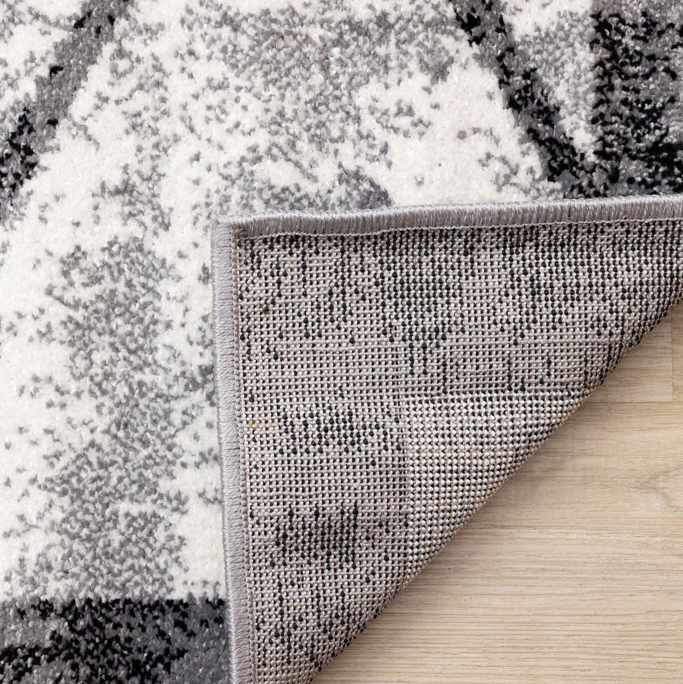 Ashwood 6'7" x 9'10" Distressed Lattice Area Rug - Grey, Black, White