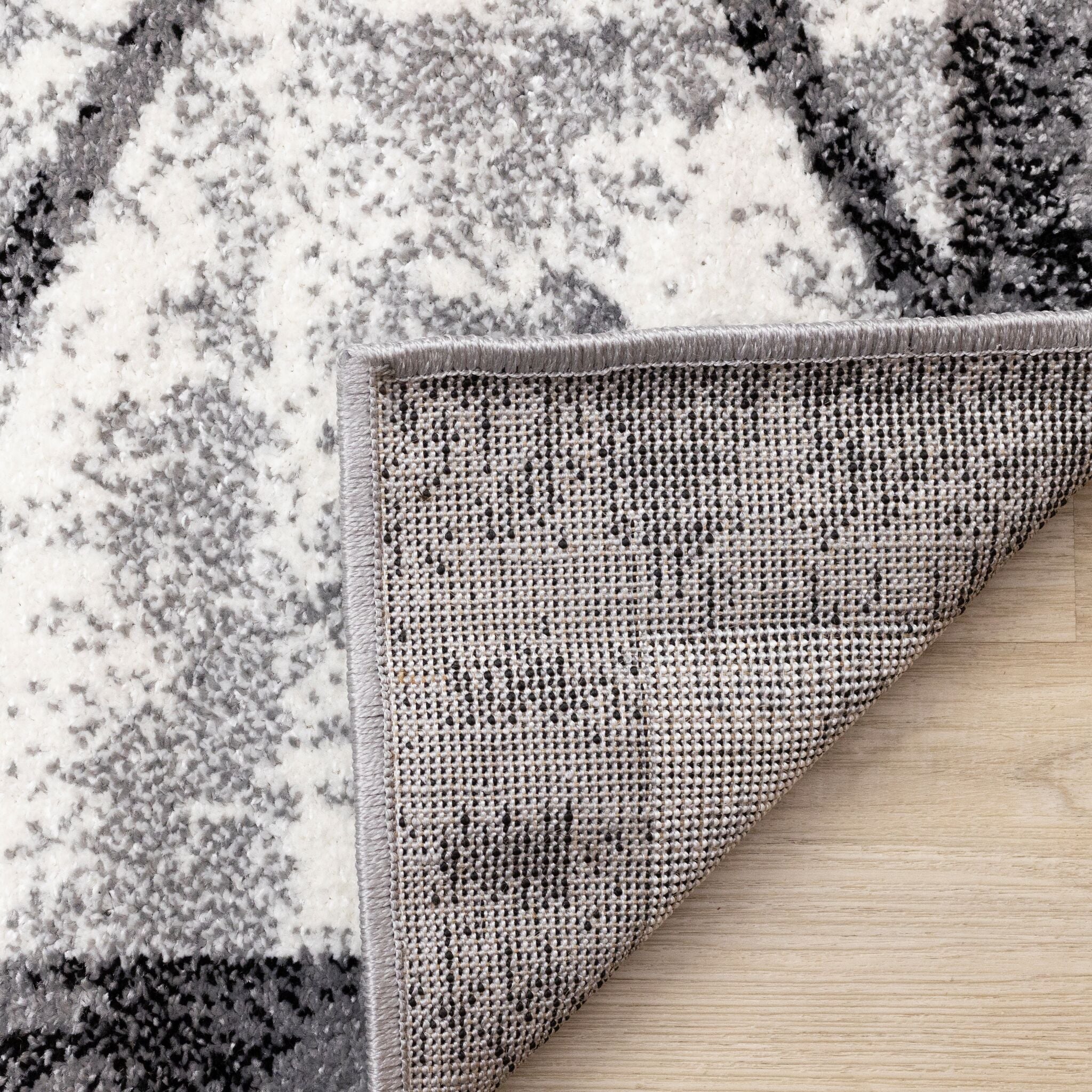 Ashwood 6'7" x 9'10" Distressed Lattice Area Rug - Grey, Black, White