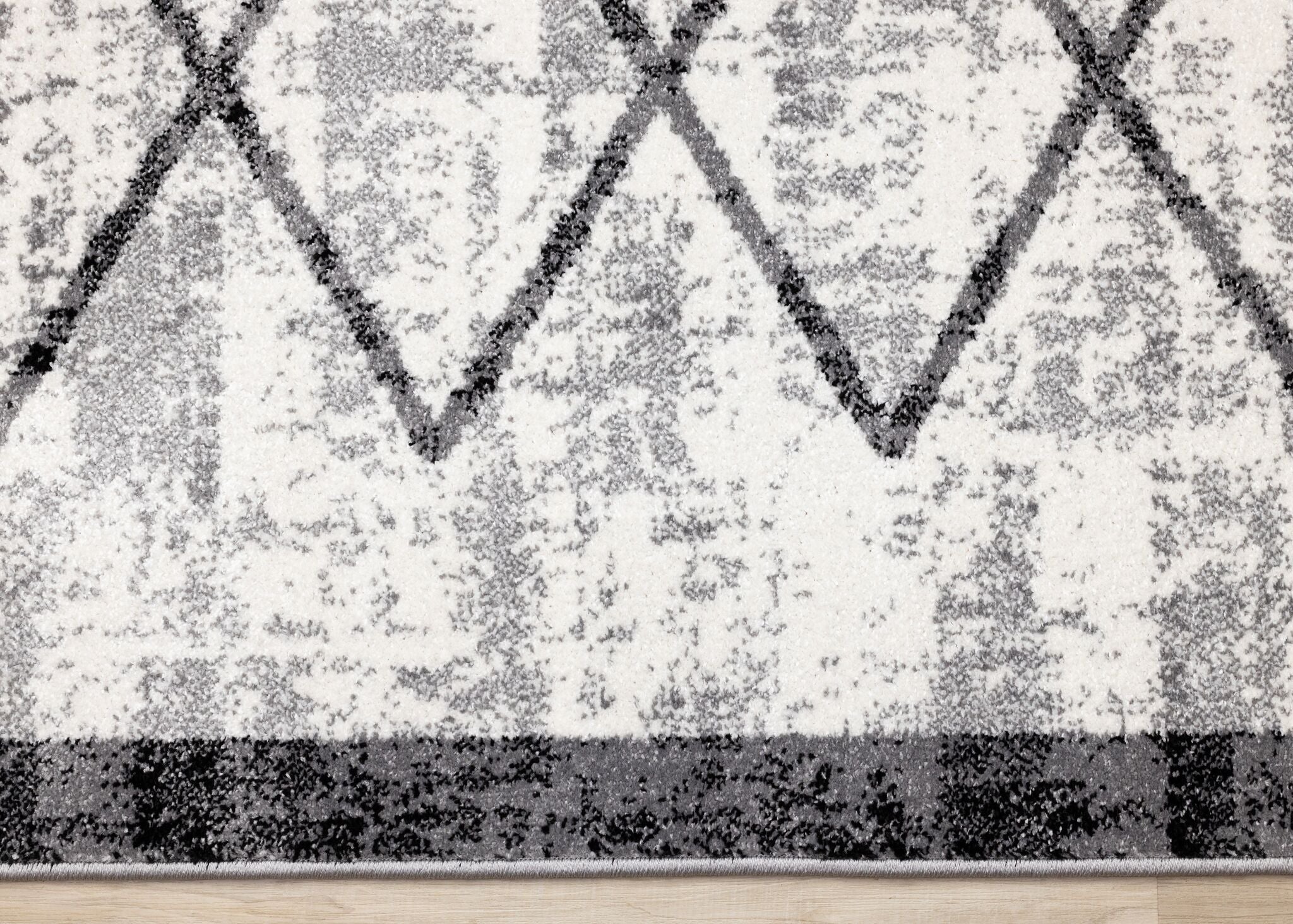 Ashwood 6'7" x 9'10" Distressed Lattice Area Rug - Grey, Black, White