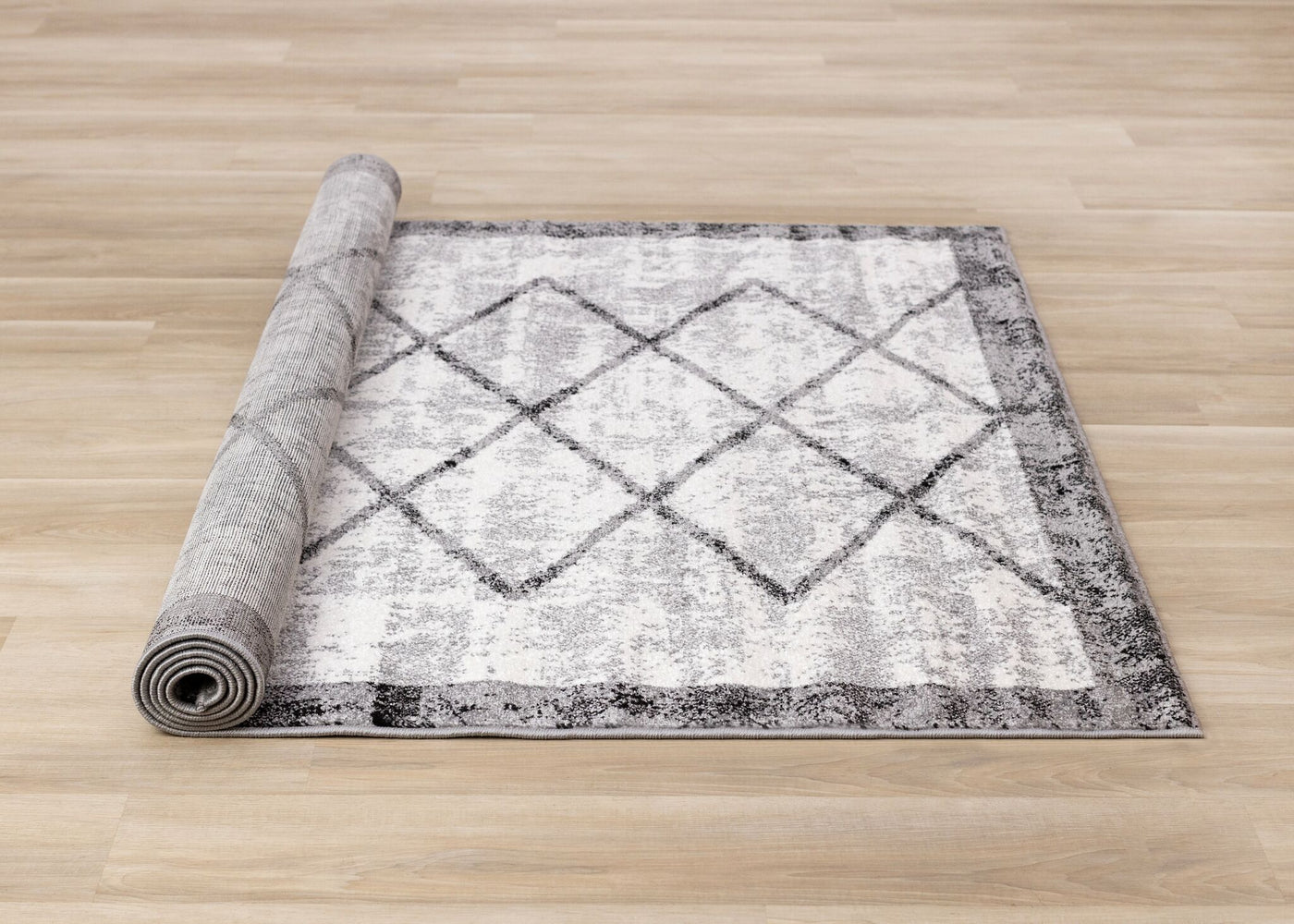 Ashwood 6'7" x 9'10" Distressed Lattice Area Rug - Grey, Black, White