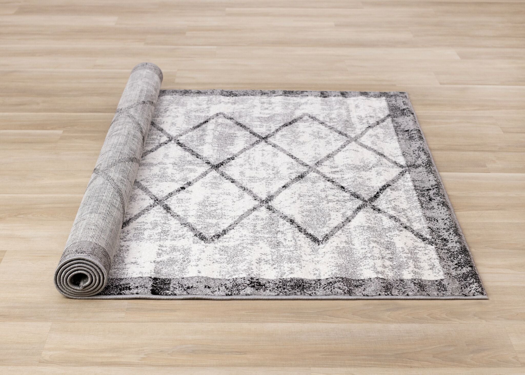 Ashwood 6'7" x 9'10" Distressed Lattice Area Rug - Grey, Black, White