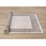 Earthly Essence 5'3" x 7'7" Distressed Border Area Rug - Taupe
