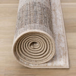 Earthly Essence 5'3" x 7'7" Distressed Border Area Rug - Taupe