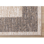 Earthly Essence 5'3" x 7'7" Distressed Border Area Rug - Taupe