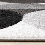 Eclipse 6'7" x 9'6" Mid-Century Modern Design Area Rug - Grey, Black, White