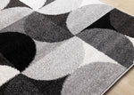 Eclipse 6'7" x 9'6" Mid-Century Modern Design Area Rug - Grey, Black, White