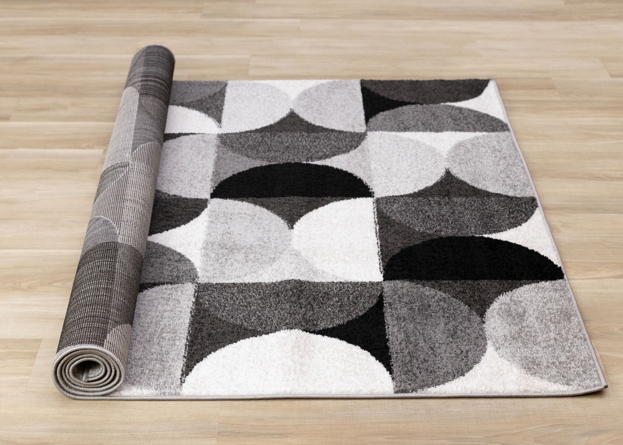 Eclipse 6'7" x 9'6" Mid-Century Modern Design Area Rug - Grey, Black, White
