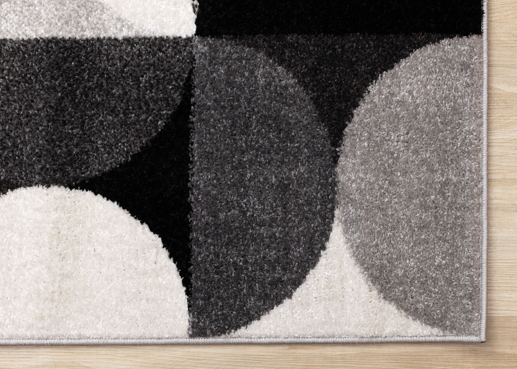 Eclipse 6'7" x 9'6" Mid-Century Modern Design Area Rug - Grey, Black, White