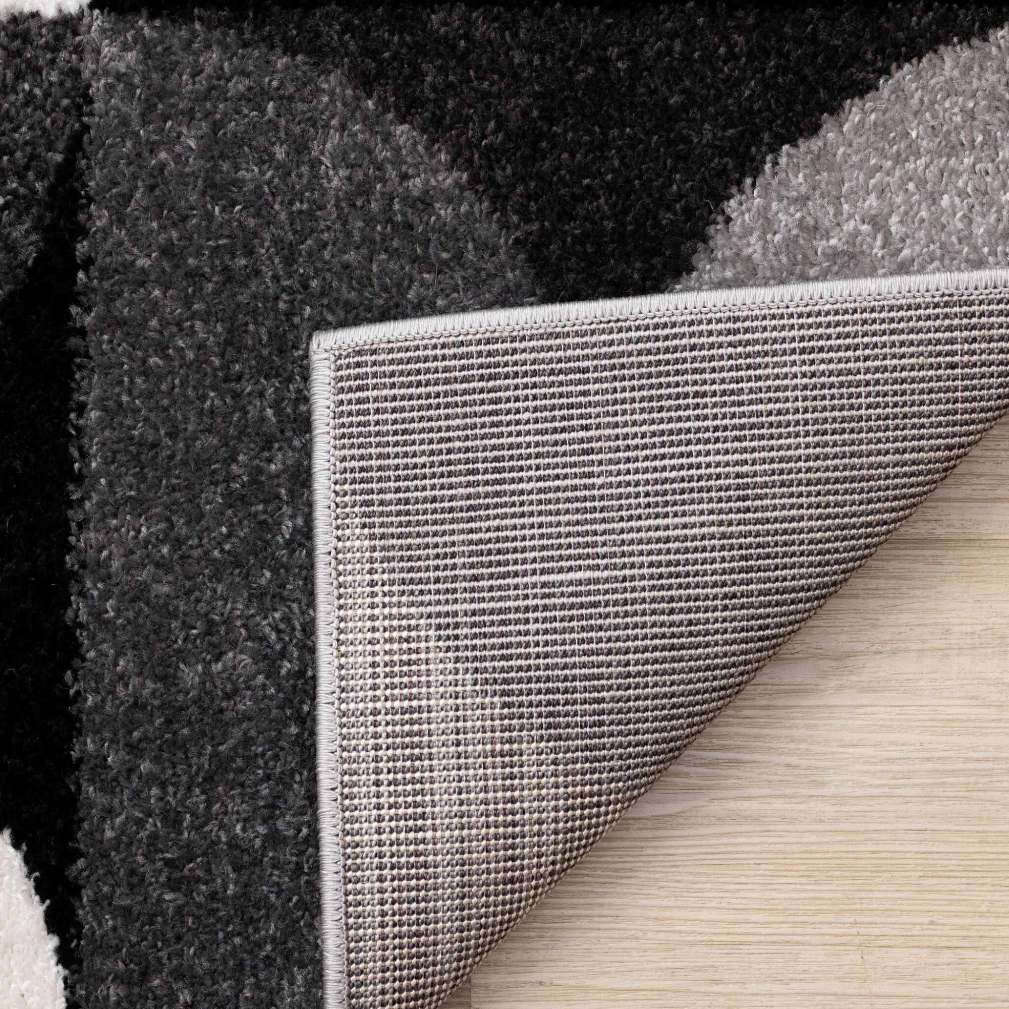 Eclipse 6'7" x 9'6" Mid-Century Modern Design Area Rug - Grey, Black, White