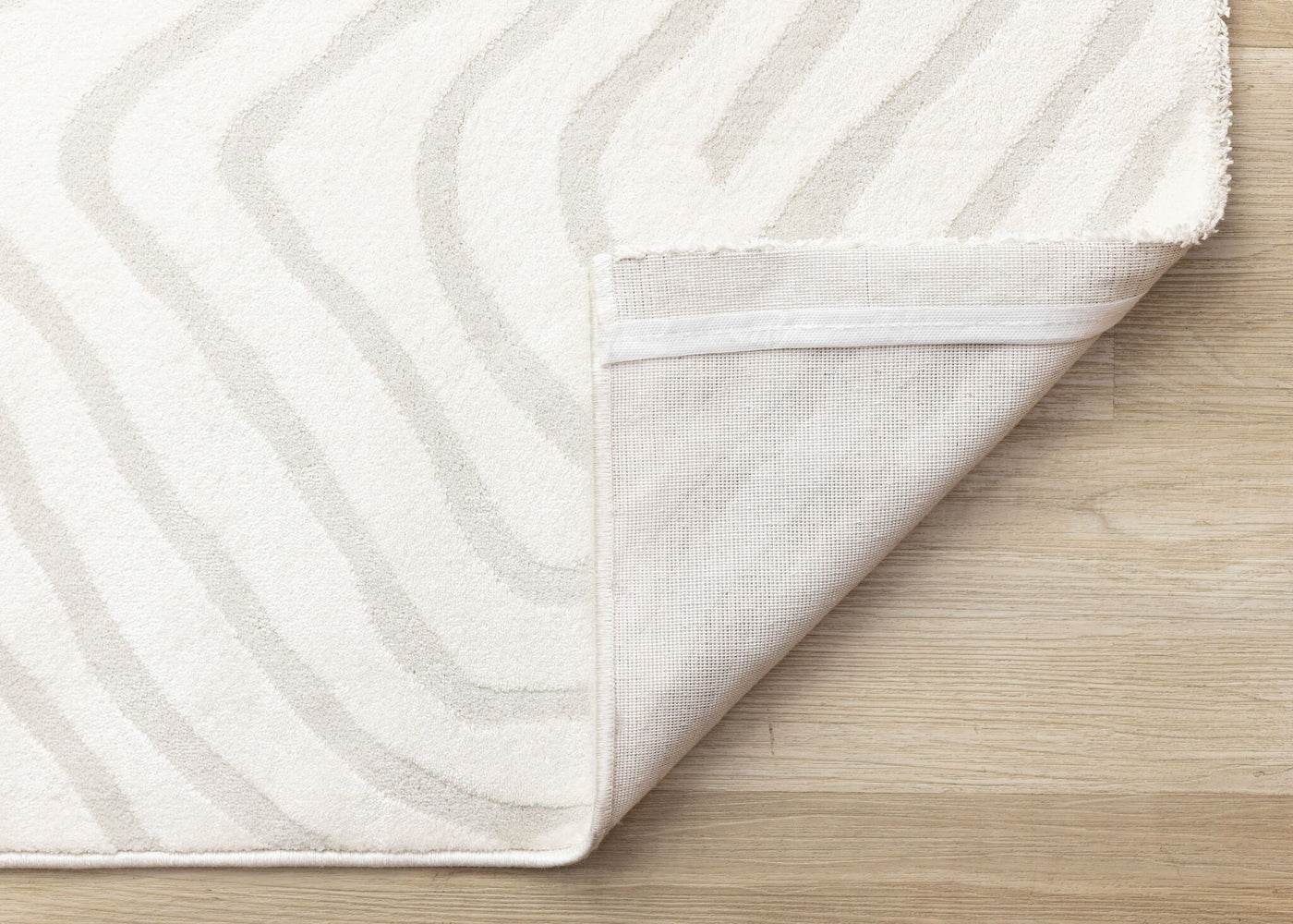 Hayden 6'7" x 9'6" Swirling Lines Area Rug - Grey