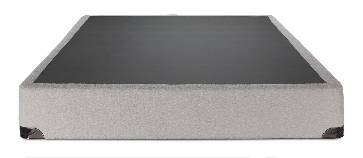Front view of the Kingsdown White Boucle full boxspring with beige polyester upholstery and black support surface