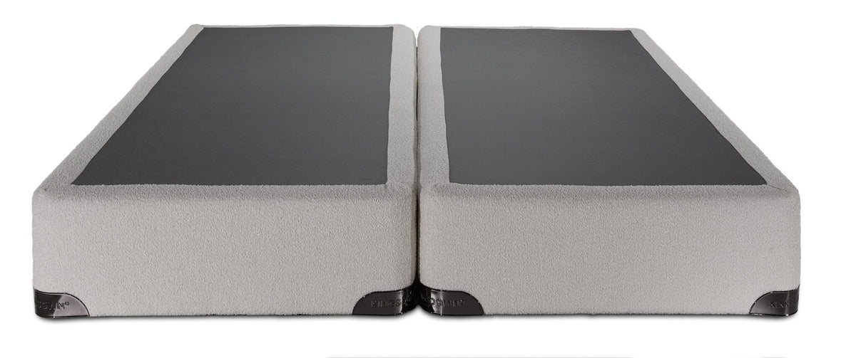 Kingsdown White Boucle queen split boxspring showing its two-piece construction and beige upholstered sides