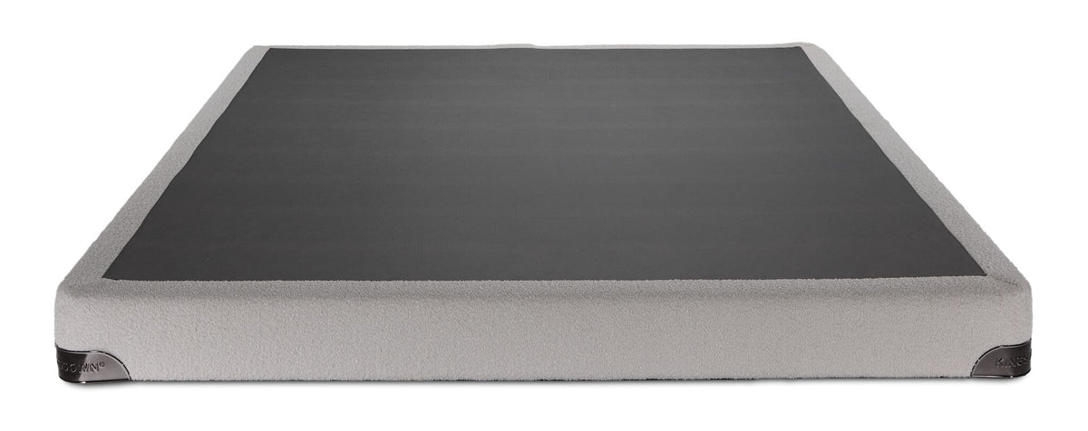 Front view of the Kingsdown White Boucle full low-profile boxspring with beige polyester upholstery and black support surface