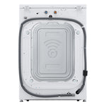 Rear panel view of LG white front load washer showing water valves and drain hose