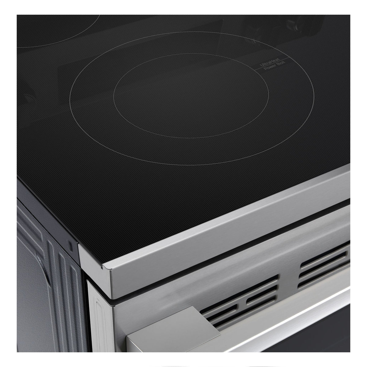 Close-up of LG electric range black glass cooktop showing UltraHeat Power Boil cooking element