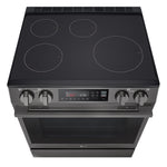 Angled top view of LG induction range showing four cooking zones, front control knobs and digital oven control panel