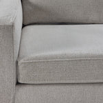 Close-up of the Laila sofa chaise beige 100% polyester upholstery showing its finely woven texture