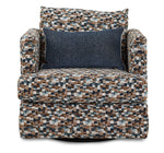 Close-up of Laila chair showing textured multicolour upholstery and contrasting blue lumbar pillow