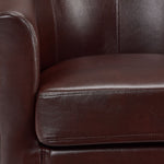 Close-up of the Lincoln Accent Chair - Brown showing smooth upholstery, seat cushion stitching and rounded arm detail