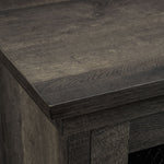 Close-up of Millbrook Fireplace TV Stand showing the textured Fawn Aged Oak wood top and layered edge detail