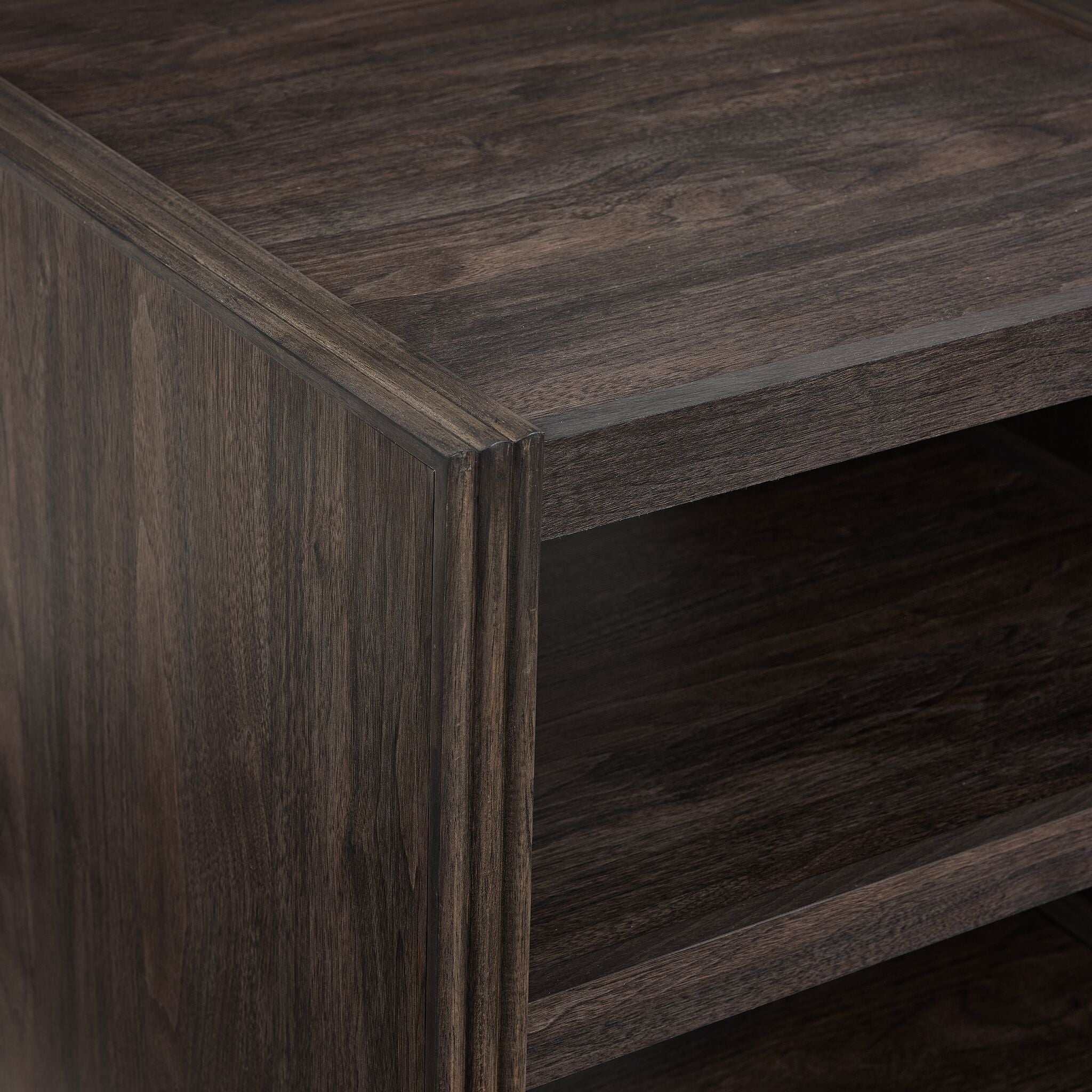 Modern Edge end table close-up showing dark grey finish, shelf edge and raised frame detail