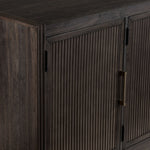 Modern Edge TV console close-up showing dark grey finish, shelf edge and picture frame detail
