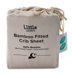 Little Leon’s Bamboo Fitted Crib Sheet in Moonbeam drawstring packaging with 100% bamboo and 250 thread count details