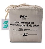 Petit Léon Moonbeam bamboo fitted crib sheet in drawstring packaging with 100% bamboo and 250 thread count details