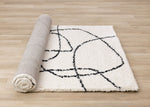 Pace 5'3" x 7'7" Outlinded Shapes Area Rug - Cream, Black