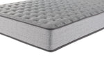 Close-up of Sealy Burchelle Extra Firm Tight Top Twin XL mattress showing tufted surface, piping and patterned side panel