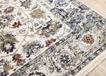 Serene 5'3" x 7'7" Intricate Border Area Rug