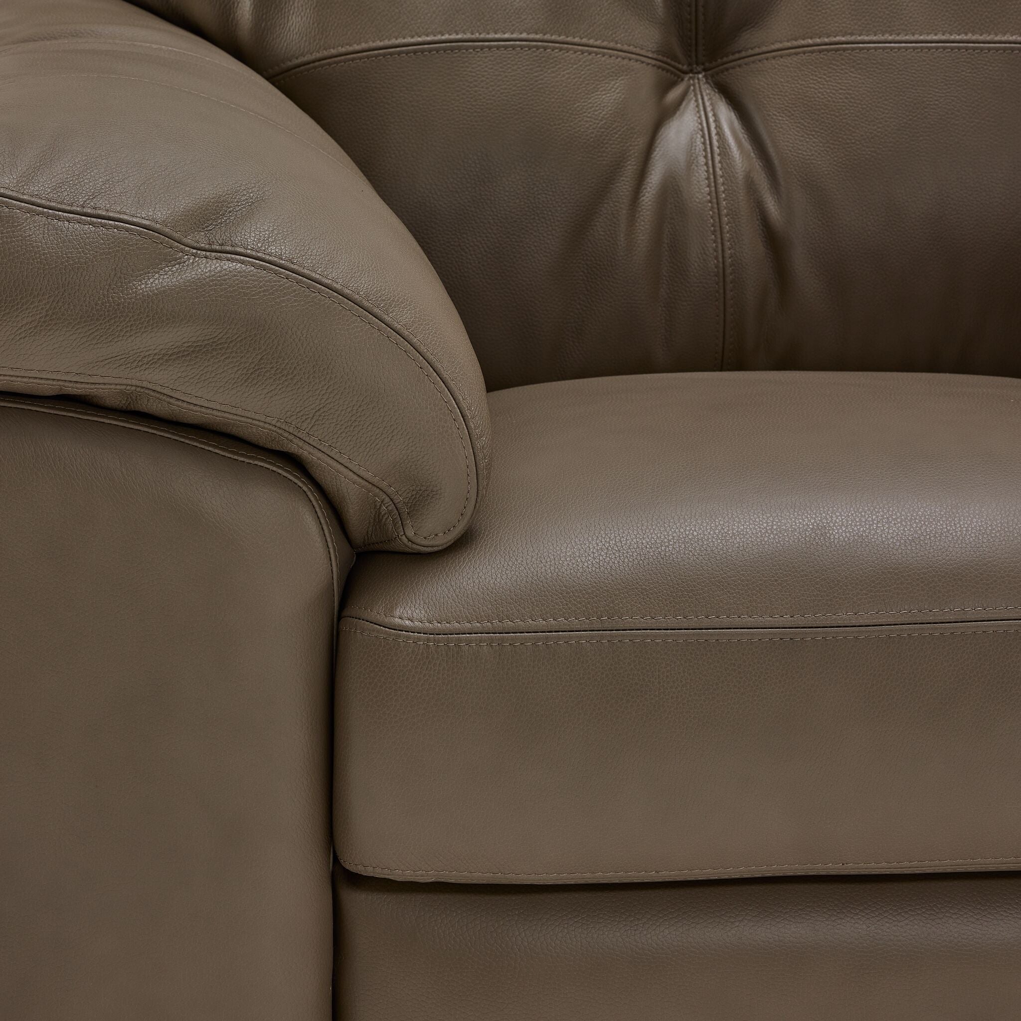 Sloan II chair close-up showing chocolate leather upholstery, seat cushion and stitching detail
