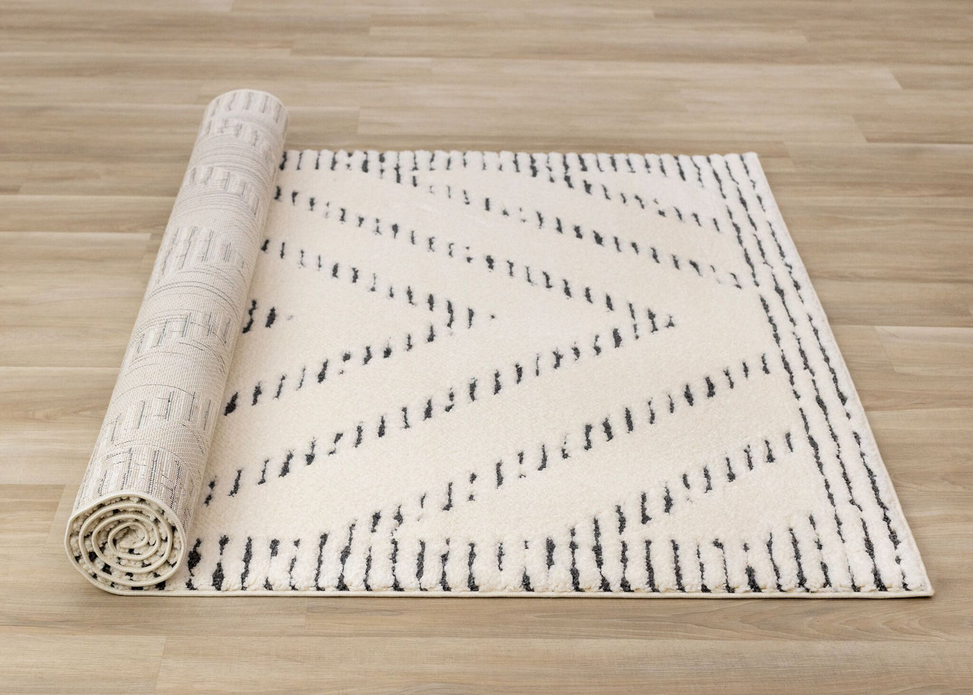 Talia 5'3" x 7'7" Striped Diamond Design Area Rug - Cream, Black