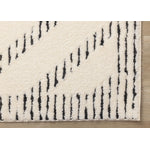 Talia 5'3" x 7'7" Striped Diamond Design Area Rug - Cream, Black