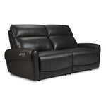 Theo Leather Dual Power Reclining Sofa - Charcoal shown at an angle with plush back cushions, padded armrests and contrast stitching