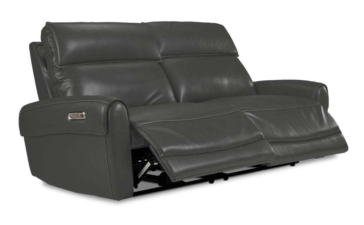 Theo Leather Dual Power Reclining Sofa - Granite shown at an angle with both power reclining footrests extended