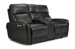 Theo Leather Dual Power Reclining Loveseat with Console - Charcoal shown at an angle with plush cushions, padded arms and centre console