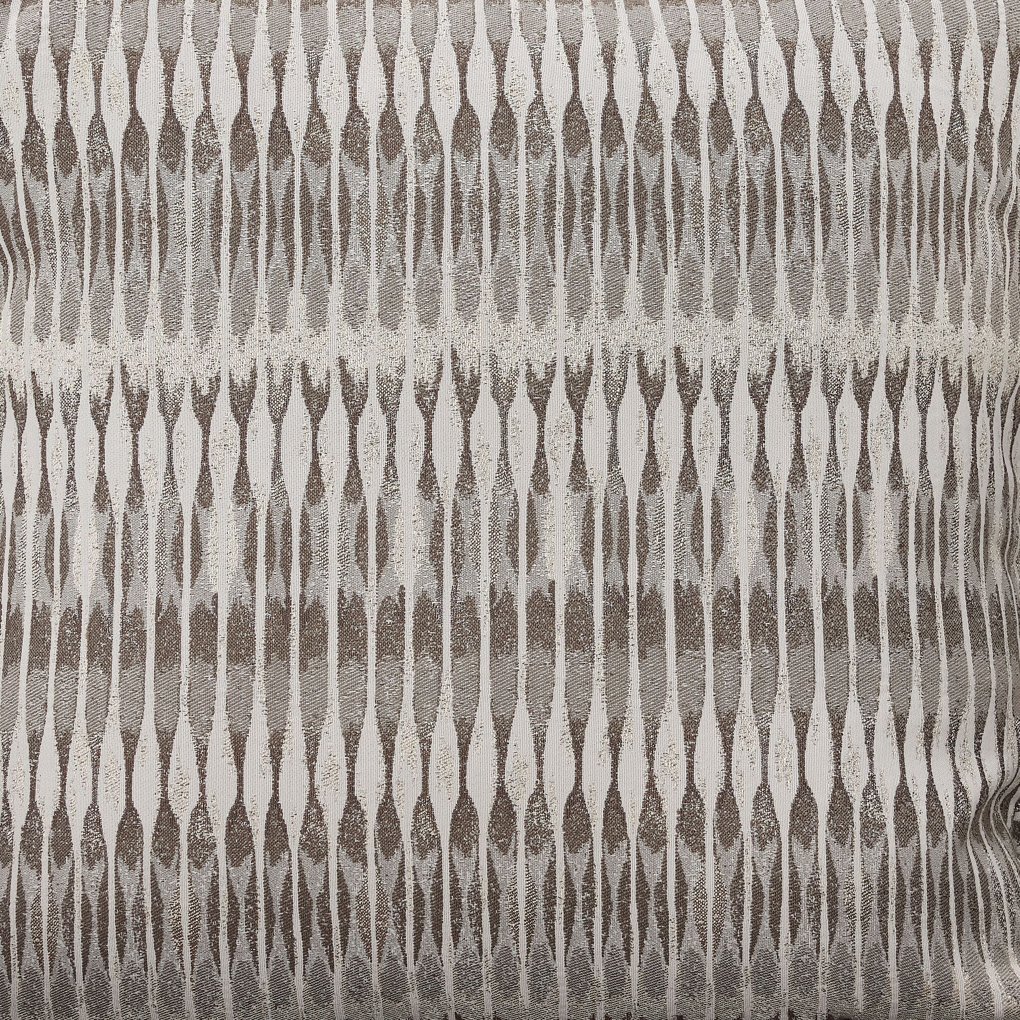 Tresor chair accent pillow close-up with light neutral patterned fabric