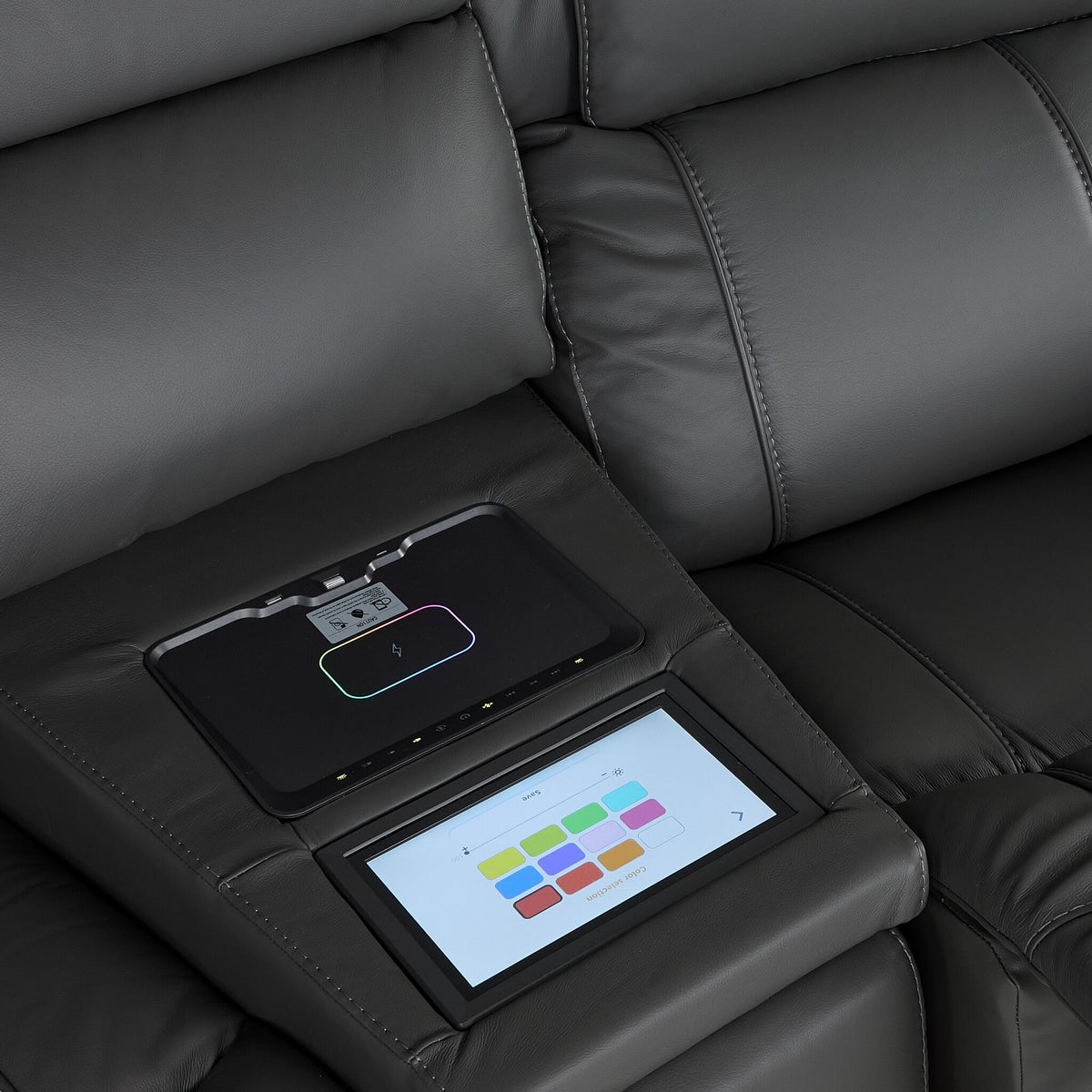 Velocity wedge console close-up showing touchscreen colour controls and illuminated wireless charging pad