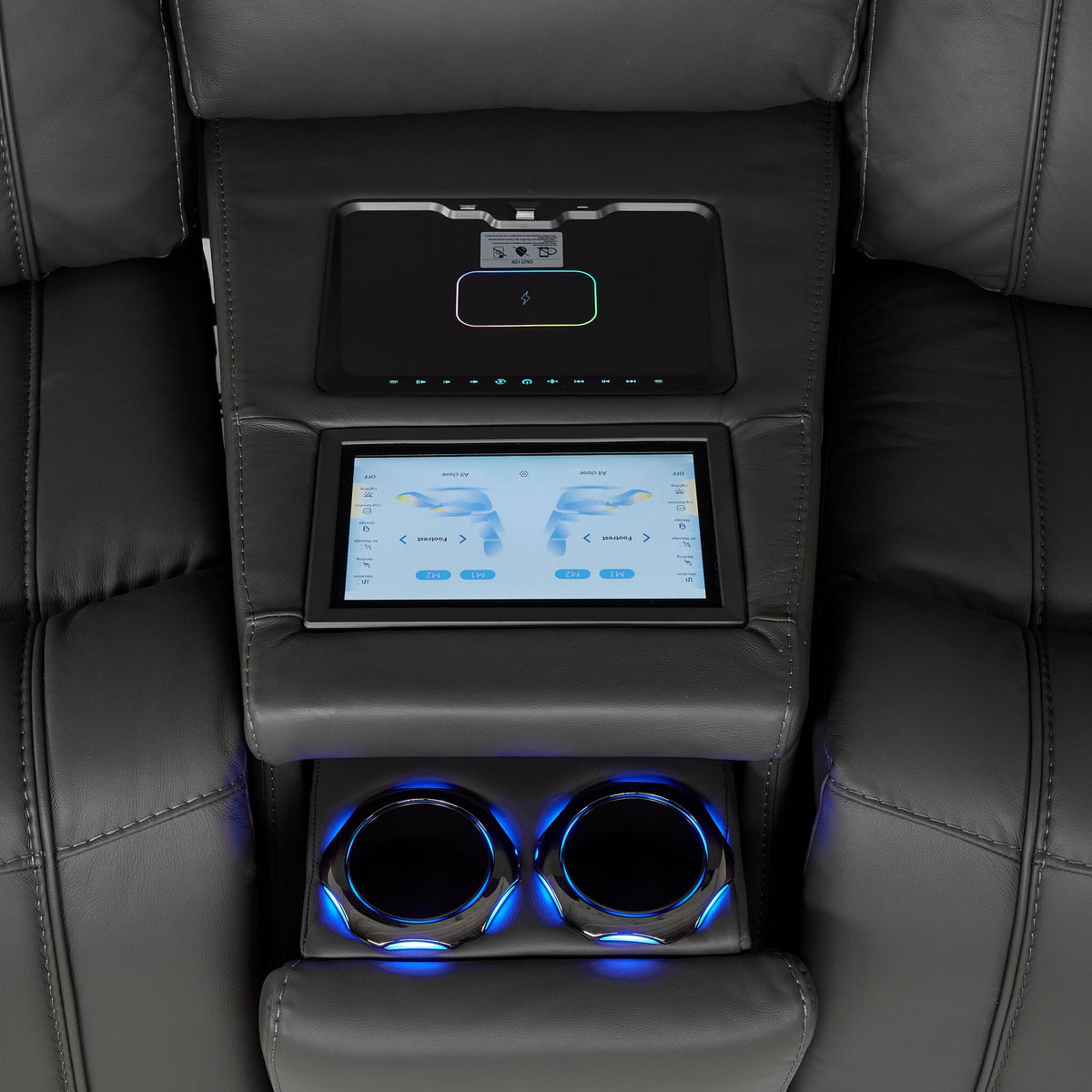 Velocity wedge console close-up with touchscreen controls, wireless charging pad and illuminated dual cupholders