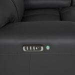 Velocity recliner close-up showing power control buttons, USB charging port and illuminated round control