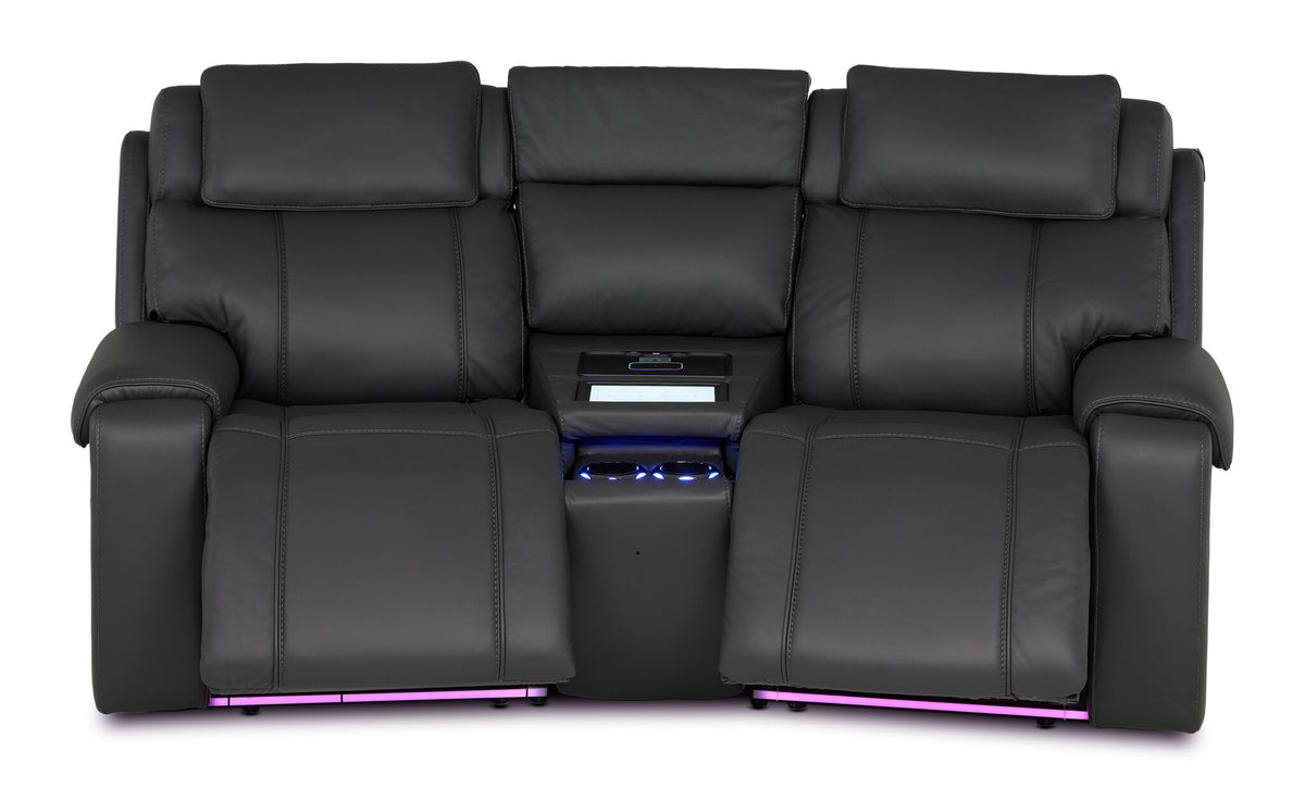 Velocity dark grey home theatre seating front view with footrests extended, illuminated console and base lighting