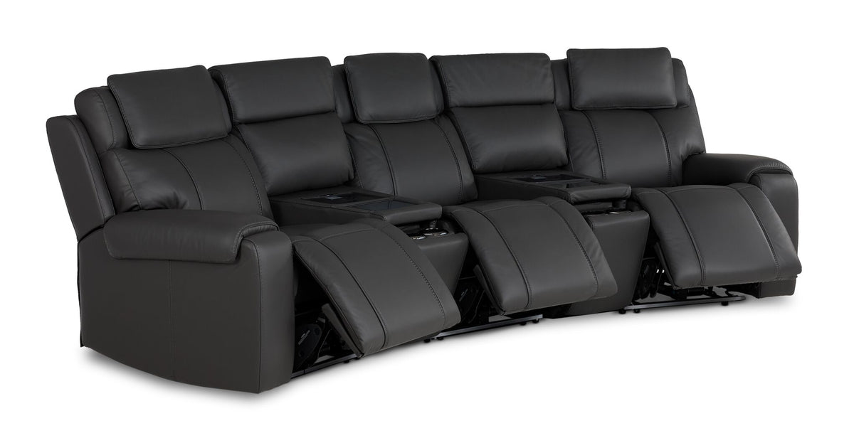 Velocity dark grey leather home theatre seating angled view with three power footrests extended and two consoles
