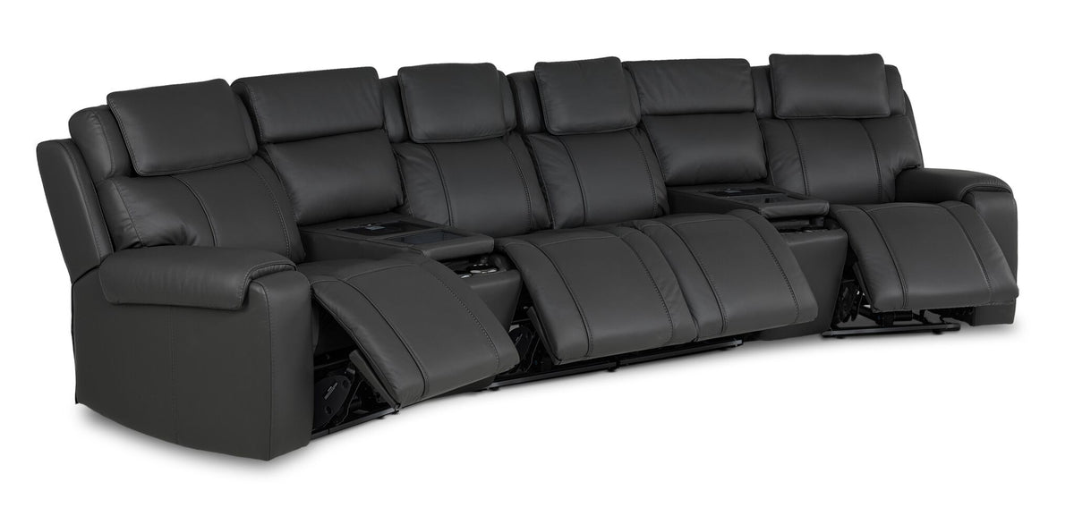 Velocity dark grey leather home theatre seating angled view with four power footrests extended and two consoles