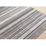 Zola 6'7" x 9'6" Patterned Rows Area Rug - Grey, White, Black