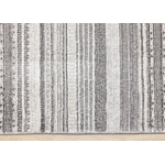 Zola 6'7" x 9'6" Patterned Rows Area Rug - Grey, White, Black