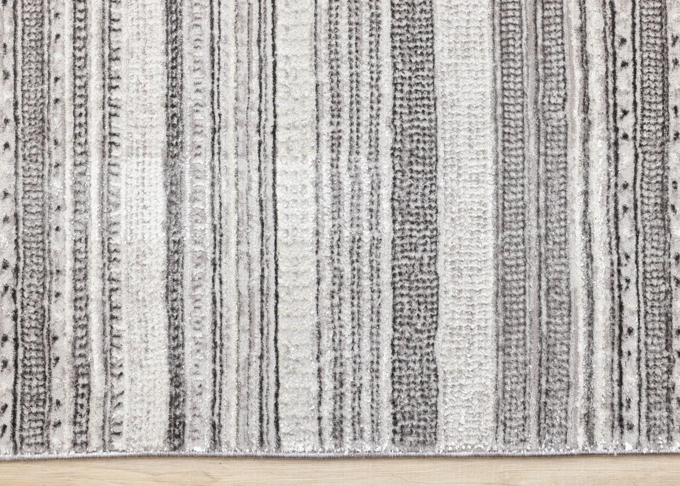 Zola 6'7" x 9'6" Patterned Rows Area Rug - Grey, White, Black