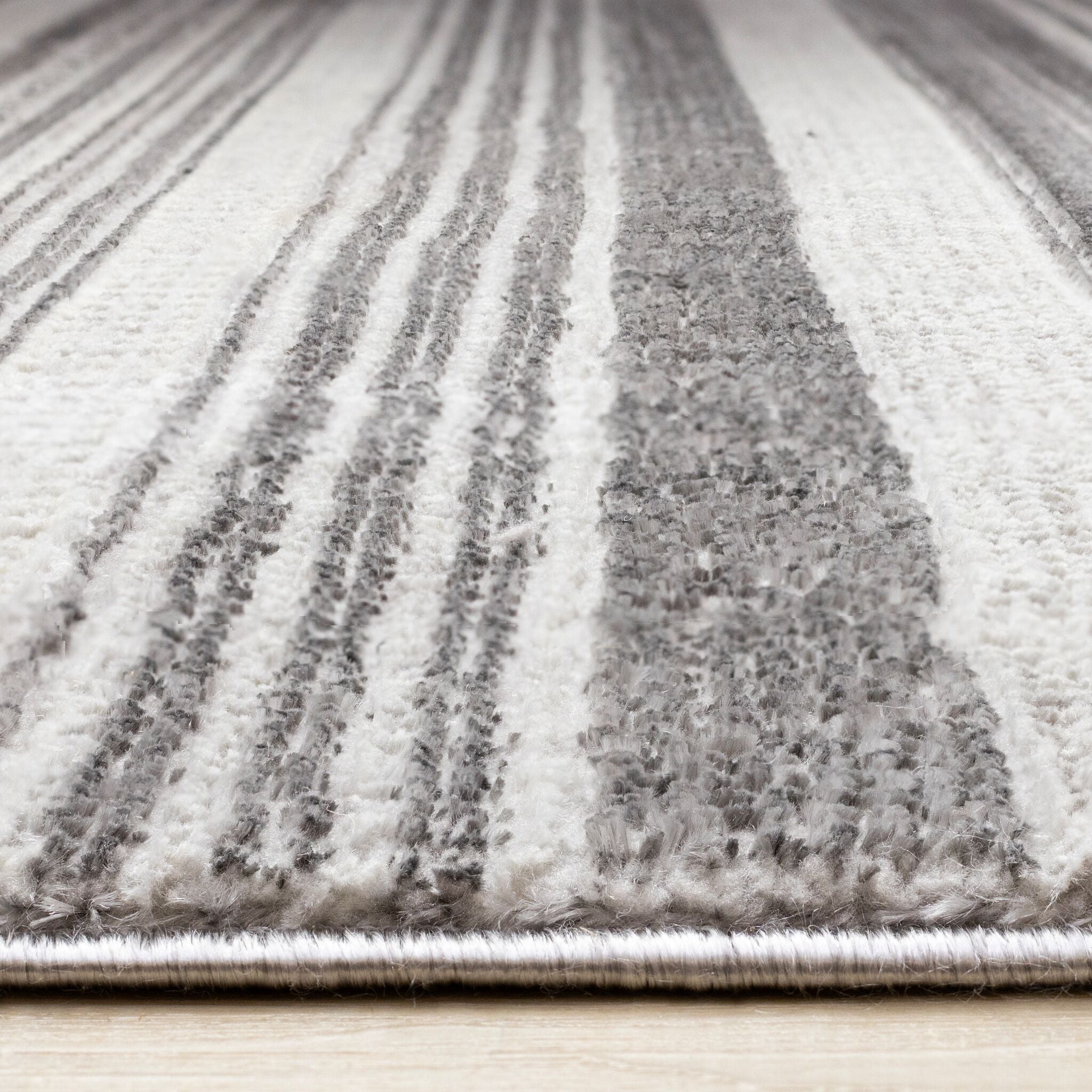 Zola 5'3" x 7'7" Patterned Rows Area Rug - Grey, White, Black