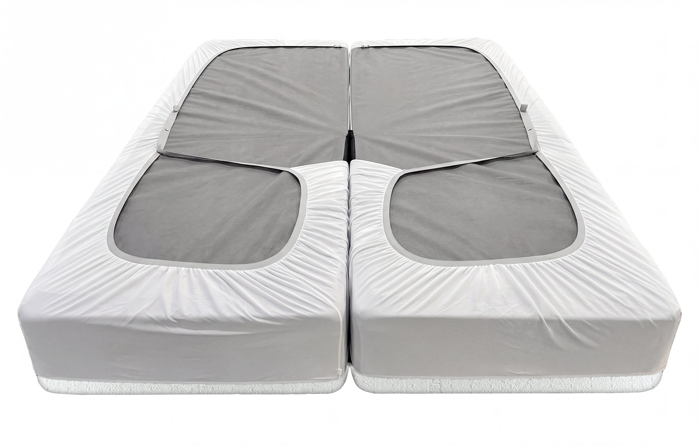Tencel Dream split head mattress protector shown fitted over two mattress sections, highlighting the centre split and fitted elastic sides
